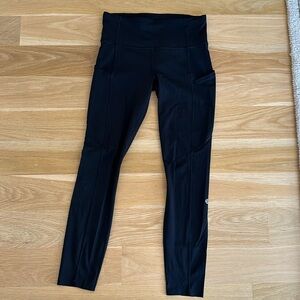 Black Luluemon Fast and Free high rise leggings with pockets. Size 6